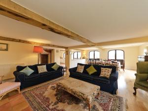A seating area at The Stables At Southfield House 