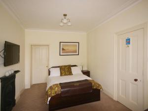 A bed or beds in a room at North Ings 