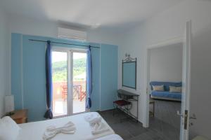 Tempat tidur dalam kamar di Residence La Scala