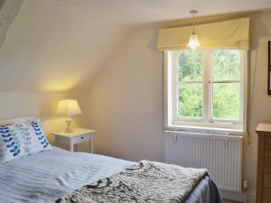 A bed or beds in a room at Park Lodge 