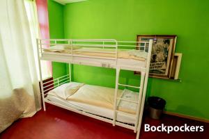 Voodi või voodid majutusasutuse Hotel & Backpackers Zak Schaffhausen toas
