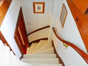 A bed or beds in a room at Open Hearth House 