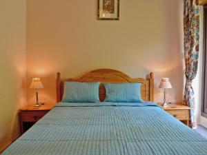 A bed or beds in a room at Little Newton 