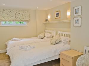 A bed or beds in a room at Little Lansker 