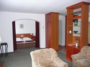 Postel nebo postele na pokoji v ubytování Hotel Ovit