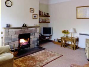 A television and/or entertainment center at Glenroyd Cottage 