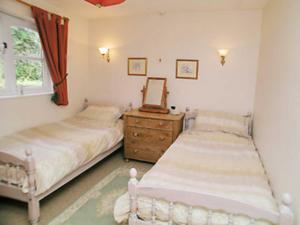 A bed or beds in a room at The Foundry 