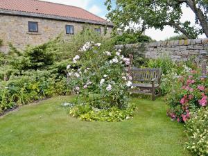 A garden outside The Old Granary 