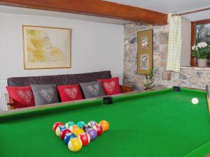A pool table at Laytham'S Farmhouse 