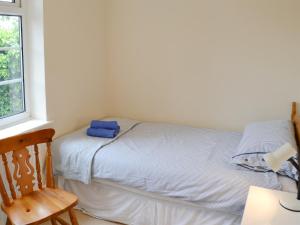 A bed or beds in a room at Carothan 