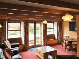 A seating area at Riverside Cottage 