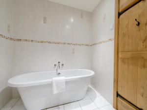 A bathroom at The Thatched Barn 