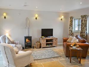 A seating area at Pippin'S Cottage 