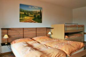 Postel nebo postele na pokoji v ubytování Résidence Castel Club Leysin Parc