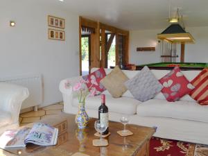 A seating area at Saunders Oast Barn 