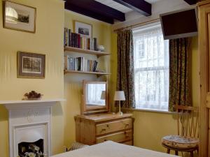 A television and/or entertainment center at St Robert'S Chantry 