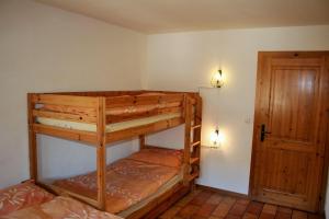 Postel nebo postele na pokoji v ubytování Résidence Castel Club Leysin Parc