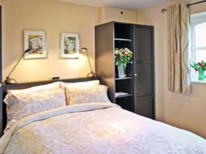 A bed or beds in a room at The Foundry 