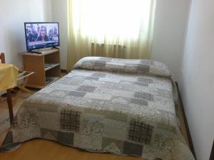 Ένα ή περισσότερα κρεβάτια σε δωμάτιο στο Apartments Liliana Pula