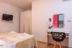 TV a/nebo společenská místnost v ubytování Accommodation Mamut