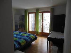 Postel nebo postele na pokoji v ubytování B&B Casa Moni