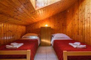 Postel nebo postele na pokoji v ubytování Accommodation Mamut