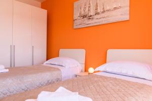 Postel nebo postele na pokoji v ubytování Accommodation Mamut