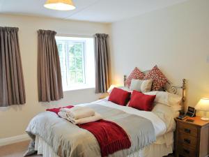 A bed or beds in a room at The Old Mill 