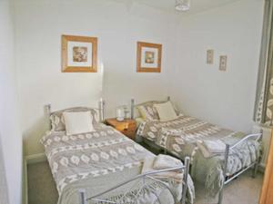 A bed or beds in a room at The Toll Bar 