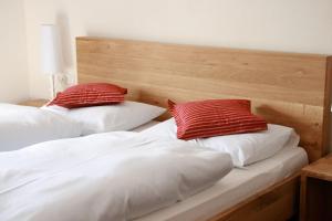 Posteľ alebo postele v izbe v ubytovaní Hotel Ploseblick