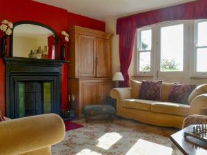 A seating area at Arrow Cottage 