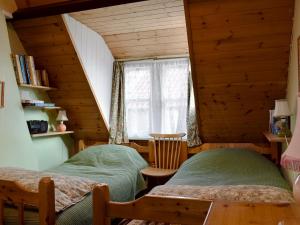 A bed or beds in a room at St Robert'S Chantry 