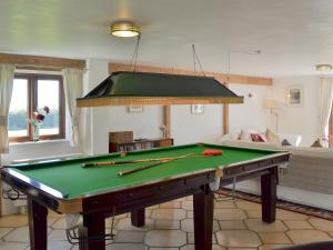 A pool table at Saunders Oast Barn 