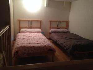 Een bed of bedden in een kamer bij Appartement Spacieux Valsois