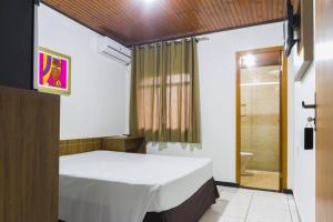 Postel nebo postele na pokoji v ubytování Hotel Holiday Foz