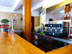 a bar in a restaurant with a counter top at Hotel German in Vilaflor