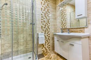 Koupelna v ubytování Apartmani Palada + 37 fotografií