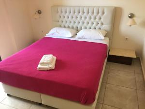 Ein Bett oder Betten in einem Zimmer der Unterkunft Belvista Luxury Apartments