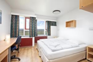 Rúm í herbergi á Hotel Edda Egilsstadir