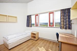 Rúm í herbergi á Hotel Edda Egilsstadir