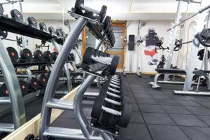 a gym with a lot of tread machines at Aiglon Morzine in Morzine