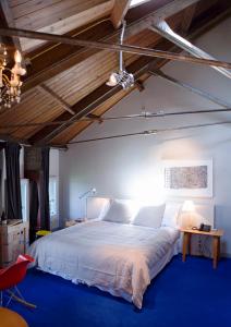 Llit o llits en una habitació de Villa Augustus