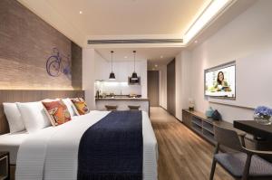 Katil atau katil-katil dalam bilik di Citadines Gaoxin Xi'an