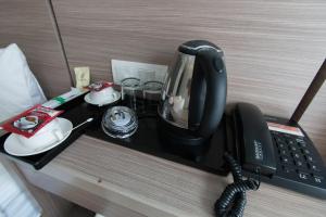 Příslušenství pro přípravu čaje a kávy v ubytování Hotel 99 SS2 Petaling Jaya