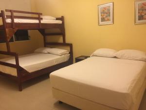 Postel nebo postele na pokoji v ubytování Casa y Mar Hotel