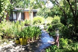 a garden with a bottle in the middle at Henry's Quirindi in Quirindi