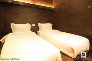 Voodi või voodid majutusasutuse Hermess Hotel Johor toas