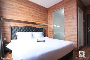 Voodi või voodid majutusasutuse Hermess Hotel Johor toas
