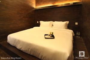Voodi või voodid majutusasutuse Hermess Hotel Johor toas