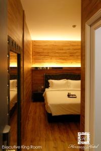 Voodi või voodid majutusasutuse Hermess Hotel Johor toas